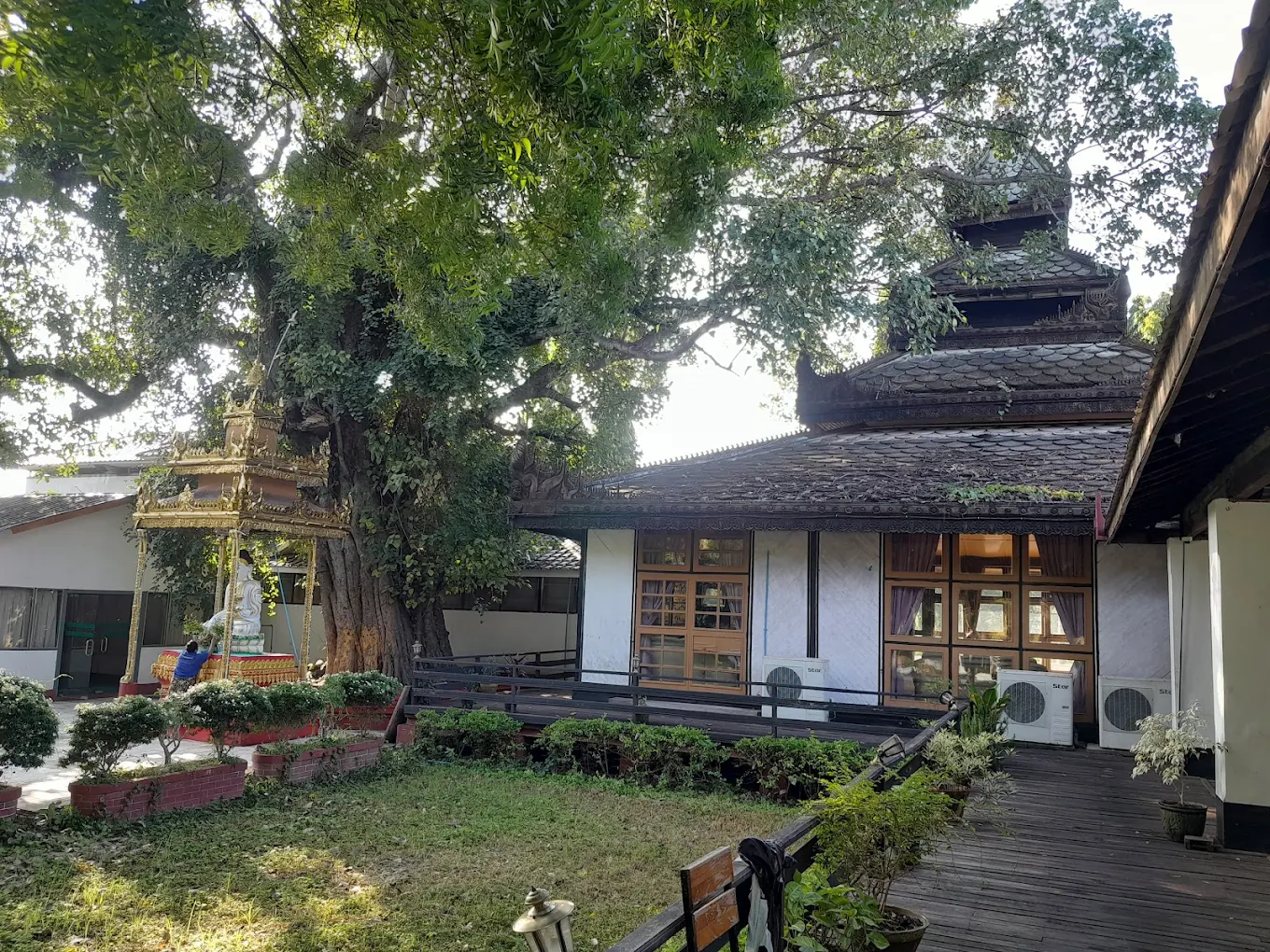Teak shrine pavilion in the gardens of the Meiktila Hotel